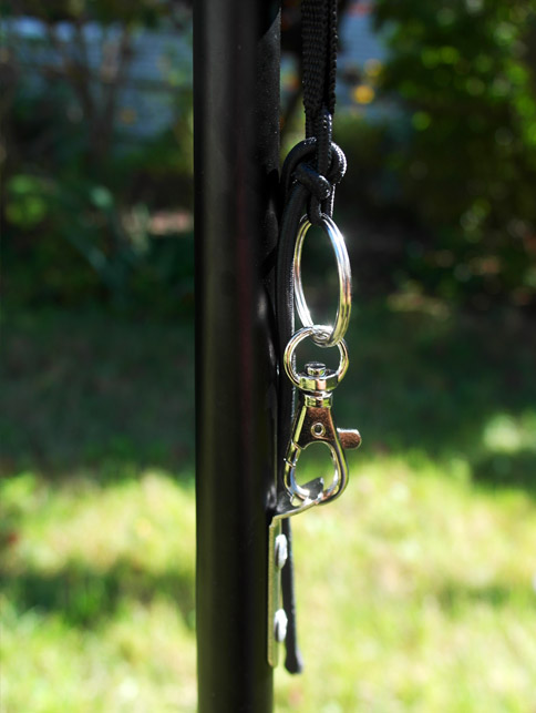 Photo showing the flag loop tied to the mount on the flag support pole Bungee cord tie