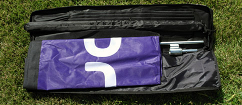 Flag banner travel case opened and on display Open flag banner travel case
