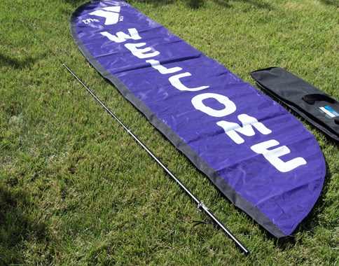 Fully assembled flag support pole shown next to the banner flag print Flag support pole