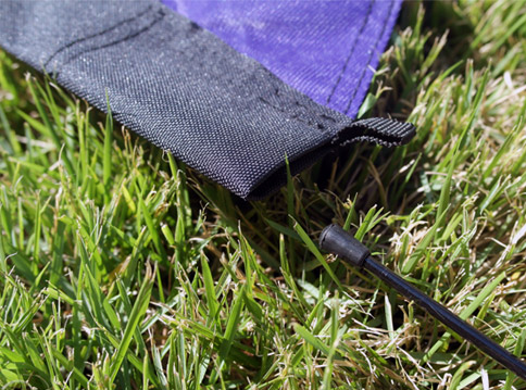 Insert the tapered end of the flag support pole Flag pocket